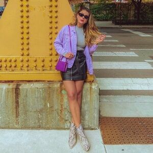 Distressed lavender denim jacket